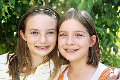 Kid in the grass - Pediatric Dentistry and Orthodontics in Burbank, CA