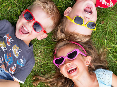 Kids in the grass - Pediatric Dentistry and Orthodontics in Burbank, CA